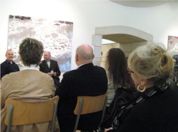 Some of the group of people that attended the event in conversation with Brendan.