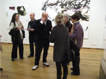 Some of the group of people that attended the event in conversation with Brendan.